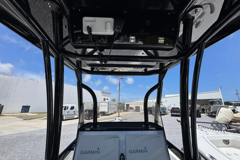 Slide: The Image of 2019 ShearWater 270 Carolina Flare boat with Garmin electronics, docked under clear blue skies. - 28