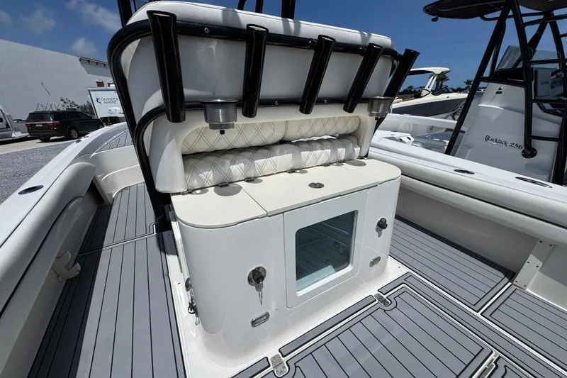 Slide: The Image of 2019 ShearWater 270 Carolina Flare boat interior with seating and storage compartments. - 30