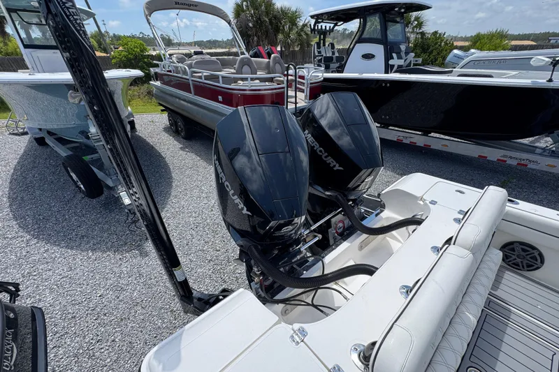 Slide: The Image of 2019 ShearWater 270 Carolina Flare boat with dual Mercury outboard engines. - 35