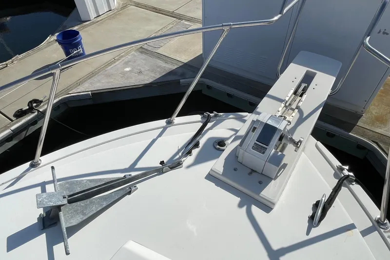 Slide: The Image of Bow of a 1987 Bertram 28 Flybridge with anchor and winch system. - 19