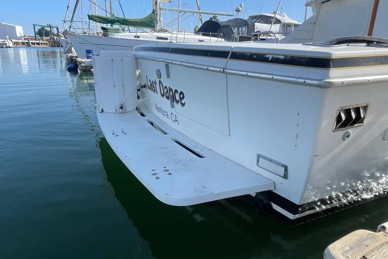 Slide: The Image of 1987 Bertram 28 Flybridge boat docked in Ventura, CA marina. - 3