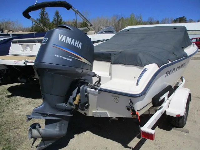 Slide: The Image of 2005 Sea Hunt 186 Escape boat with Yamaha outboard motor. - 2