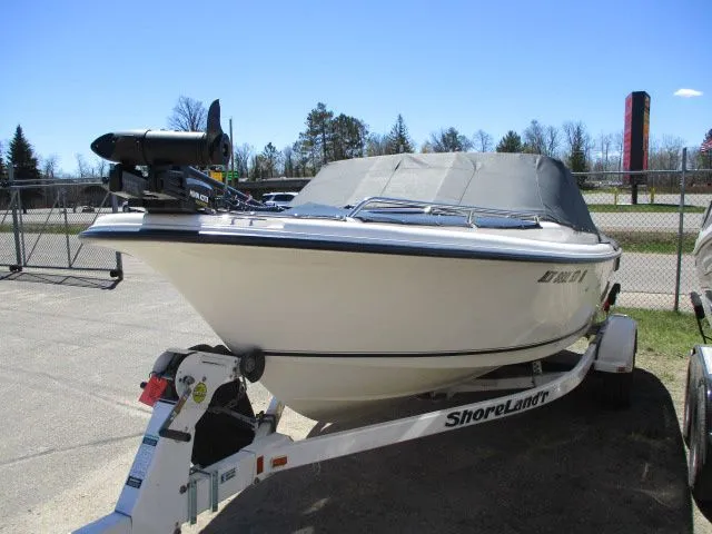 Slide: The Image of 2005 Sea Hunt 186 Escape boat on trailer outdoors. - 4