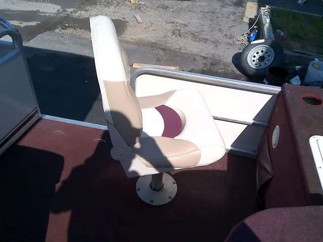 Slide: The Image of Boat seat on a 2002 Godfrey 240 FISH AND FAMILY. - 11