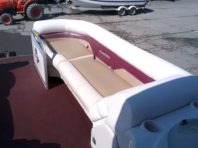 Slide: The Image of Interior of a 2002 Godfrey 240 FISH AND FAMILY boat with seating area. - 5