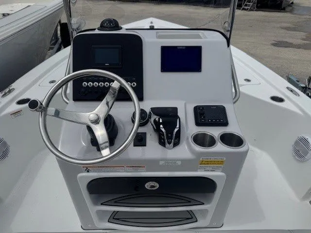 Slide: The Image of Helm console of Sea Pro 210DLX boat, model year 2026. - 8