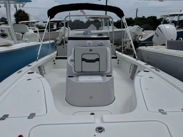 Slide: The Image of 2026 Sea Pro 210DLX boat, white deck, modern features. - 9