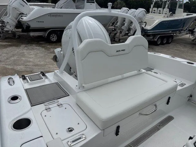 Slide: The Image of 2026 Sea Pro 225 FLXR Sandbar boat, rear view, white interior. - 3