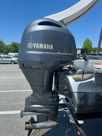 Slide: The Image of Yamaha outboard motor on a 2023 Godfrey Monaco 235 SD boat. - 16