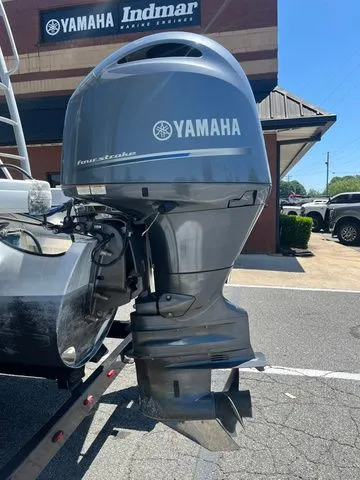 Slide: The Image of Yamaha outboard motor on a 2023 Godfrey Monaco 235 SD boat. - 17