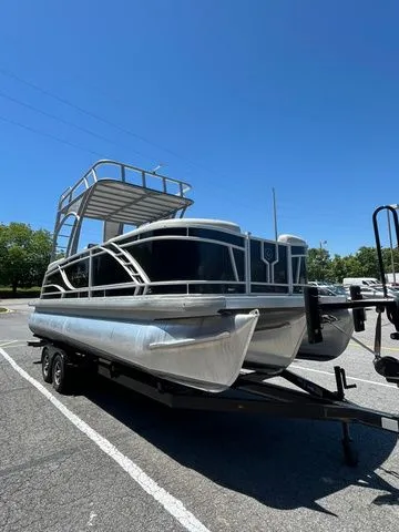 Slide: The Image of 2023 Godfrey Monaco 235 SD pontoon boat on trailer outdoors. - 4