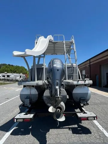 Slide: The Image of 2023 Godfrey Monaco 235 SD boat with slide and outboard motor. - 5