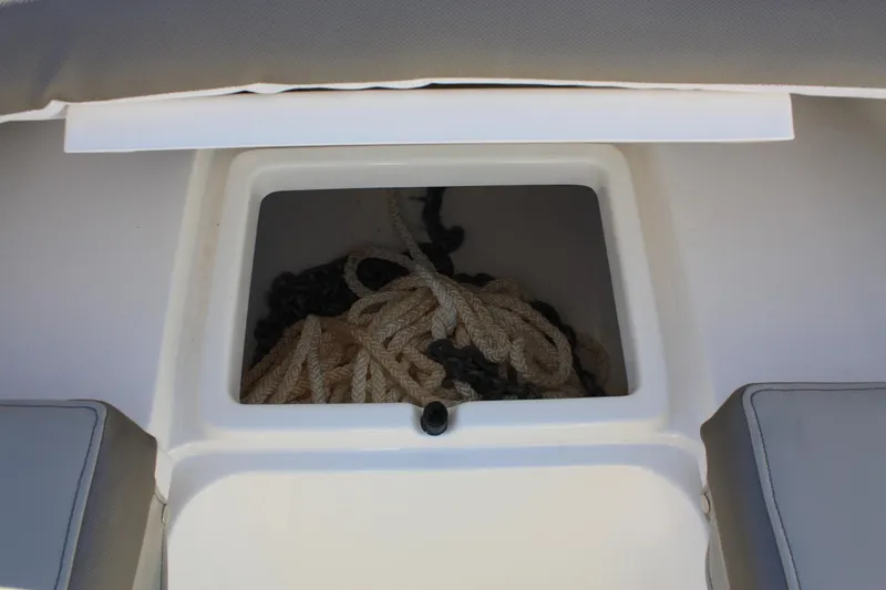 Slide: The Image of Storage compartment in Key West 263 FS boat, 2023 model. - 21