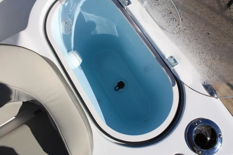 Slide: The Image of 2023 Key West 263 FS boat with blue livewell. - 28