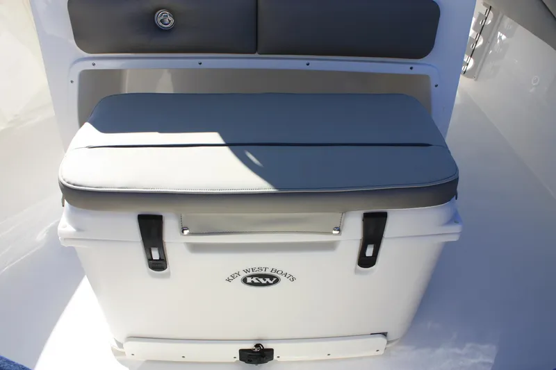 Slide: The Image of Key West 263 FS 2023 boat cooler with seat cushion. - 32