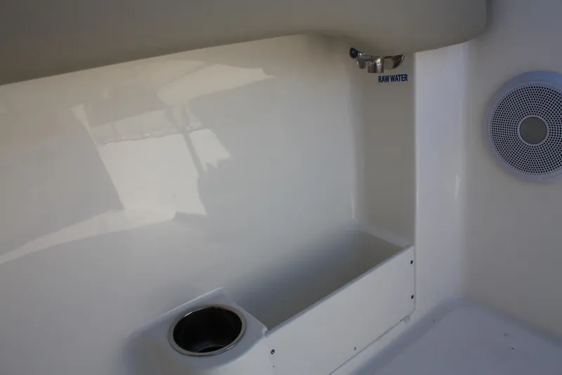 Slide: The Image of Interior of Key West 263 FS boat, 2023 model, featuring speaker and faucet. - 36