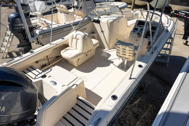 Slide: The Image of 2018 Grady-White Freedom 215 boat with Yamaha engine, featuring spacious seating and sleek design. - 15