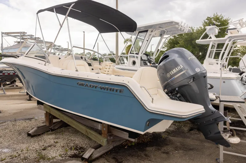 Slide: The Image of 2018 Grady-White Freedom 215 boat with Yamaha engine on display. - 2