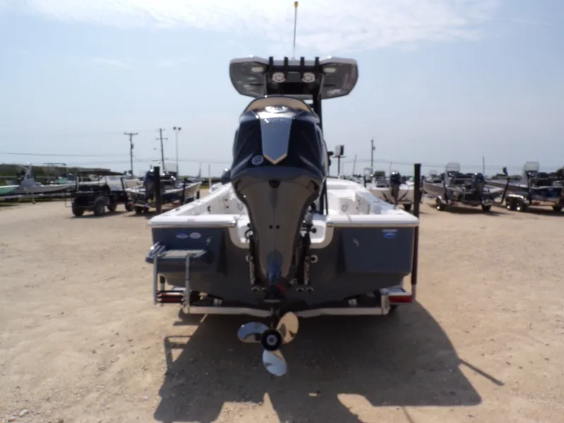 Slide: The Image of Rear view of a 2026 Tidewater 2210 Carolina Bay boat on a trailer. - 10