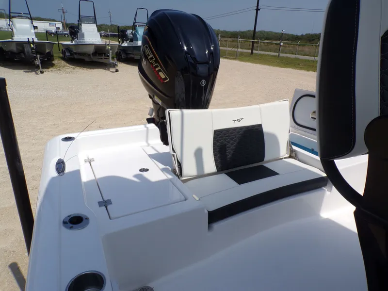 Slide: The Image of 2026 Tidewater 2210 Carolina Bay boat with outboard motor. - 39