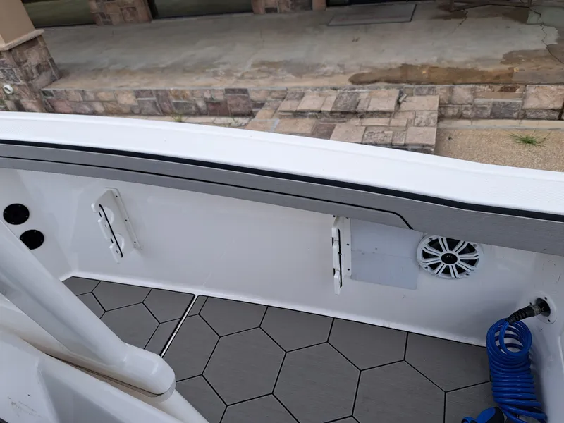 Slide: The Image of Interior view of a 2020 Yamaha 210 FSH Sport boat. - 23
