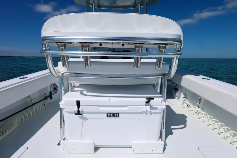 Slide: The Image of 2026 Contender 29 Bay boat with Yeti cooler on deck, ocean backdrop. - 14