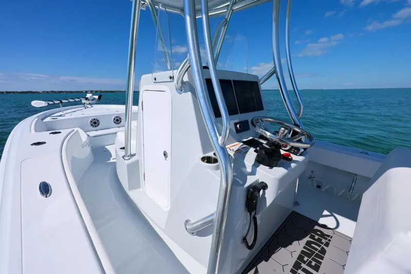 Slide: The Image of 2026 Contender 29 Bay boat on open sea. - 17