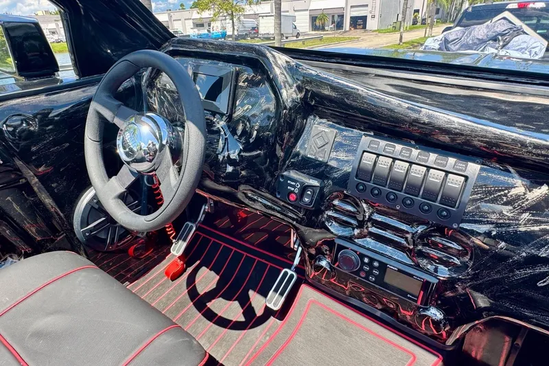 Slide: The Image of Interior of 2025 Watersports Car Series R, featuring sleek dashboard and modern controls. - 16