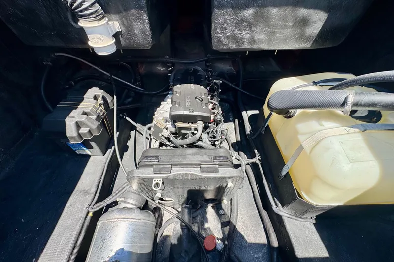 Slide: The Image of Engine compartment of 2025 Watersports Car Series R, showcasing mechanical components and wiring. - 17