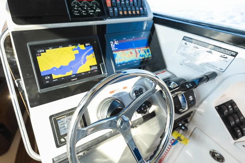Slide: The Image of Everglades 350EX 2011 helm with navigation system and controls. - 7