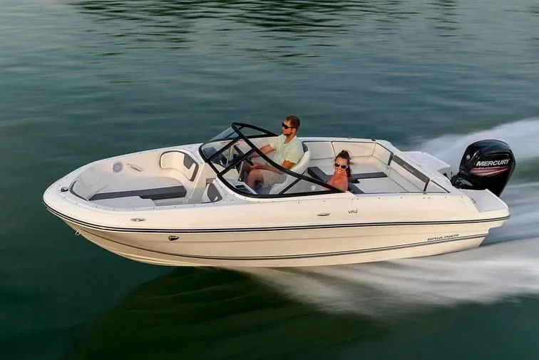 Slide: The Image of 2019 Bayliner VR4 Bowrider OB on calm water with two passengers. - 16