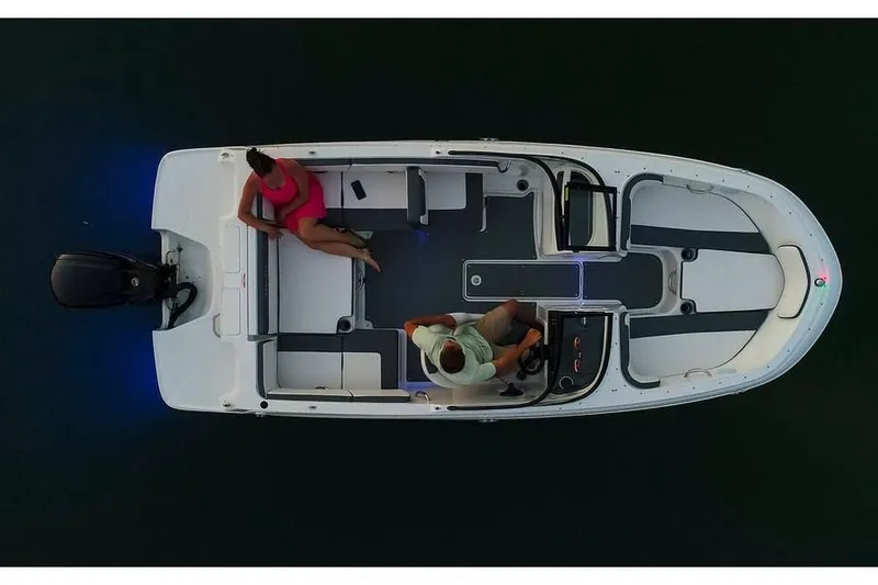 Slide: The Image of Aerial view of 2019 Bayliner VR4 Bowrider OB with two people onboard. - 19