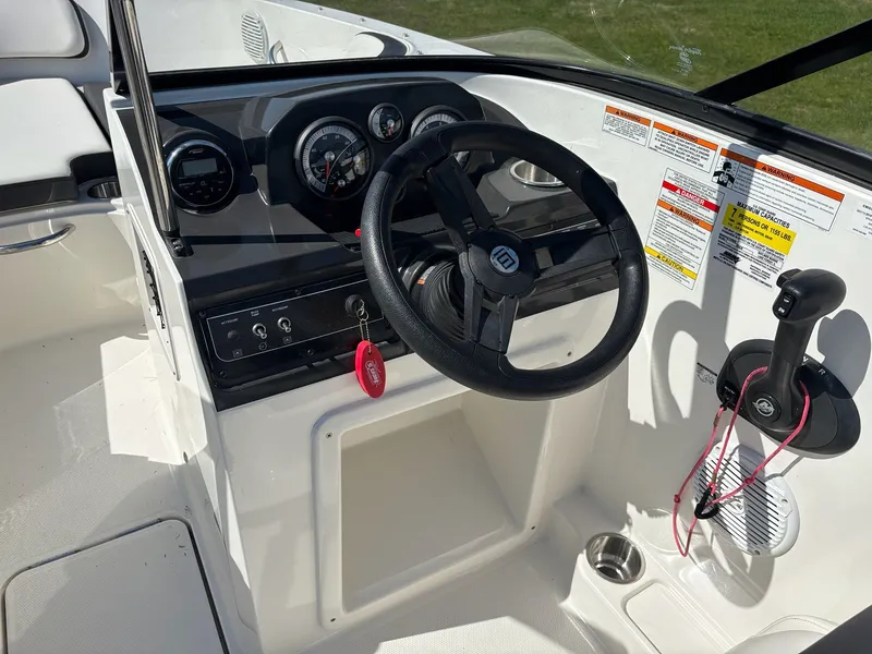 Slide: The Image of Interior view of 2019 Bayliner VR4 Bowrider OB cockpit. - 9