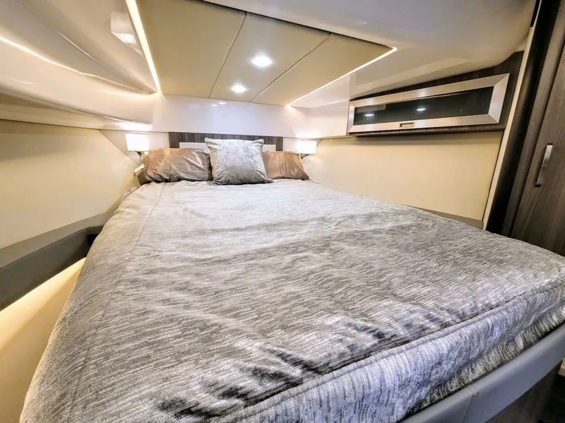 Slide: The Image of Luxurious bedroom in Regal 36 Grand Coupe 2022 yacht. - 32