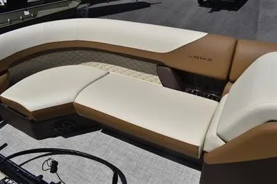 Slide: The Image of 2026 Lowe SF 232 Sport Fish boat interior with beige and brown seating. - 17
