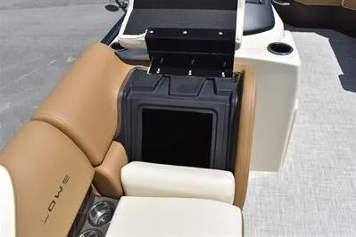 Slide: The Image of 2026 Lowe SF 232 Sport Fish boat interior with tan seating and storage compartment. - 19
