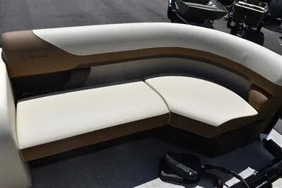 Slide: The Image of 2026 Lowe SF 232 Sport Fish boat seating, featuring beige and brown upholstery. - 20