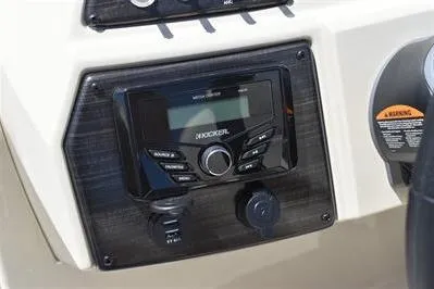 Slide: The Image of 2026 Lowe SF 232 Sport Fish boat dashboard with Kicker stereo system. - 31
