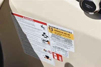 Slide: The Image of 2026 Lowe SF 232 Sport Fish capacity label, maximum 13 persons or 1951 lbs. - 37