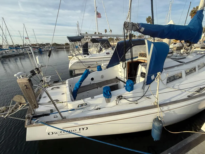 Slide: The Image of 1980 Rival 32 sailboat docked in marina. - 10