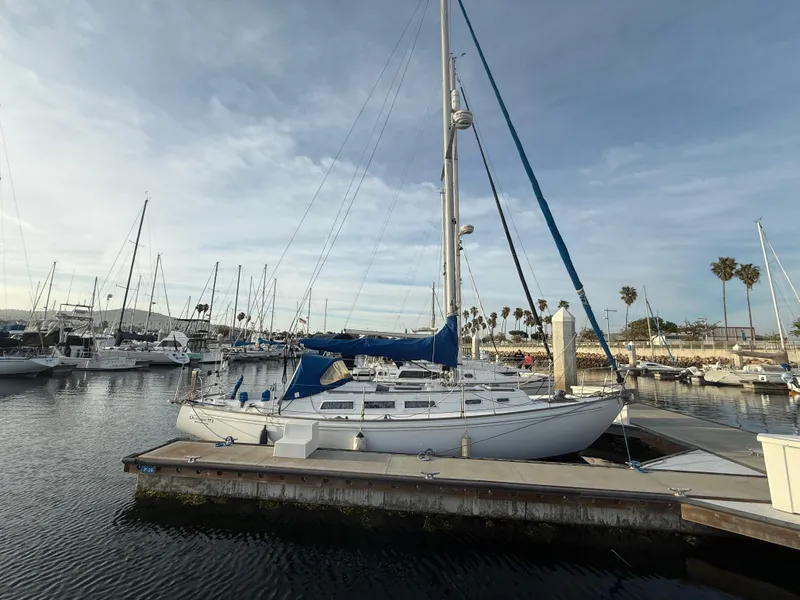 Slide: The Image of 1980 Rival 32 sailboat docked in marina. - 7