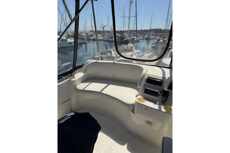 Slide: The Image of 2007 Silverton 33 Convertible yacht interior with marina view. - 9