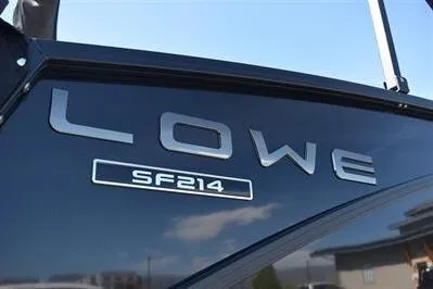 Slide: The Image of 2026 Lowe SF 214 Sport Fish boat, sleek black exterior with model branding. - 12