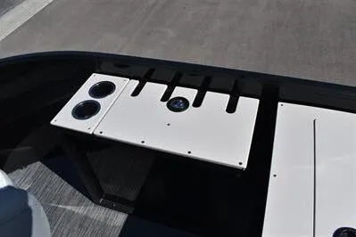 Slide: The Image of 2026 Lowe SF 214 Sport Fish boat deck with cup holders and storage slots. - 20