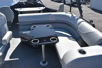 Slide: The Image of 2026 Lowe SF 214 Sport Fish boat interior with seating and table. - 24
