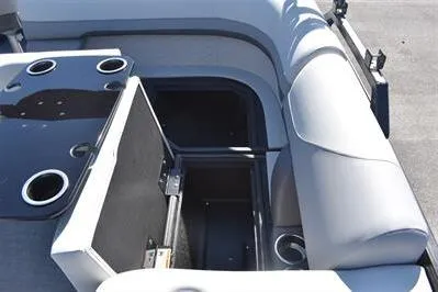 Slide: The Image of 2026 Lowe SF 214 Sport Fish boat interior with storage compartment and cup holders. - 25