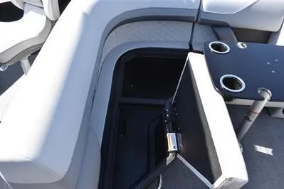 Slide: The Image of 2026 Lowe SF 214 Sport Fish boat interior with storage compartment and cup holders. - 26