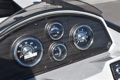Slide: The Image of Dashboard of 2026 Lowe SF 214 Sport Fish boat with fuel, RPM, and trim gauges. - 36