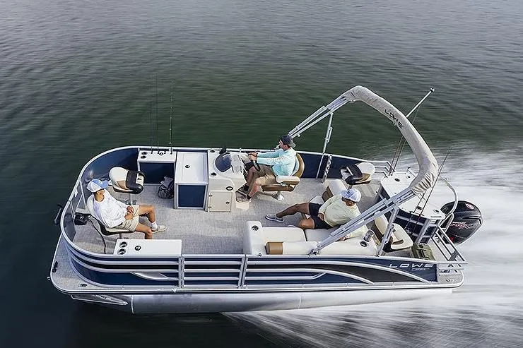 Slide: The Image of Manufacturer Provided Image: 2025 Lowe SF 214 pontoon boat cruising on water with passengers. - 41
