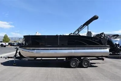 Slide: The Image of 2026 Lowe SF 214 Sport Fish pontoon boat on trailer, side view. - 7